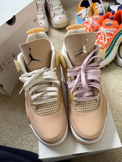 Jordan 4 woman size 12 fit men size 10.5