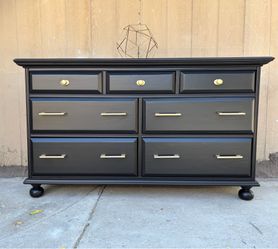 Beautiful black & gold dresser or console