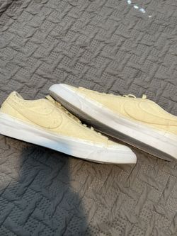 Cream colored Nikes size 12