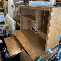 Desk with Slide out shelf for writing or keyboard. 