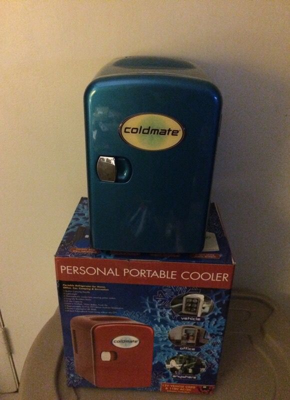Cold mate personal portable cooler- 12 v vehicle cooler & 110 v AC/DC adapter included. Never been used