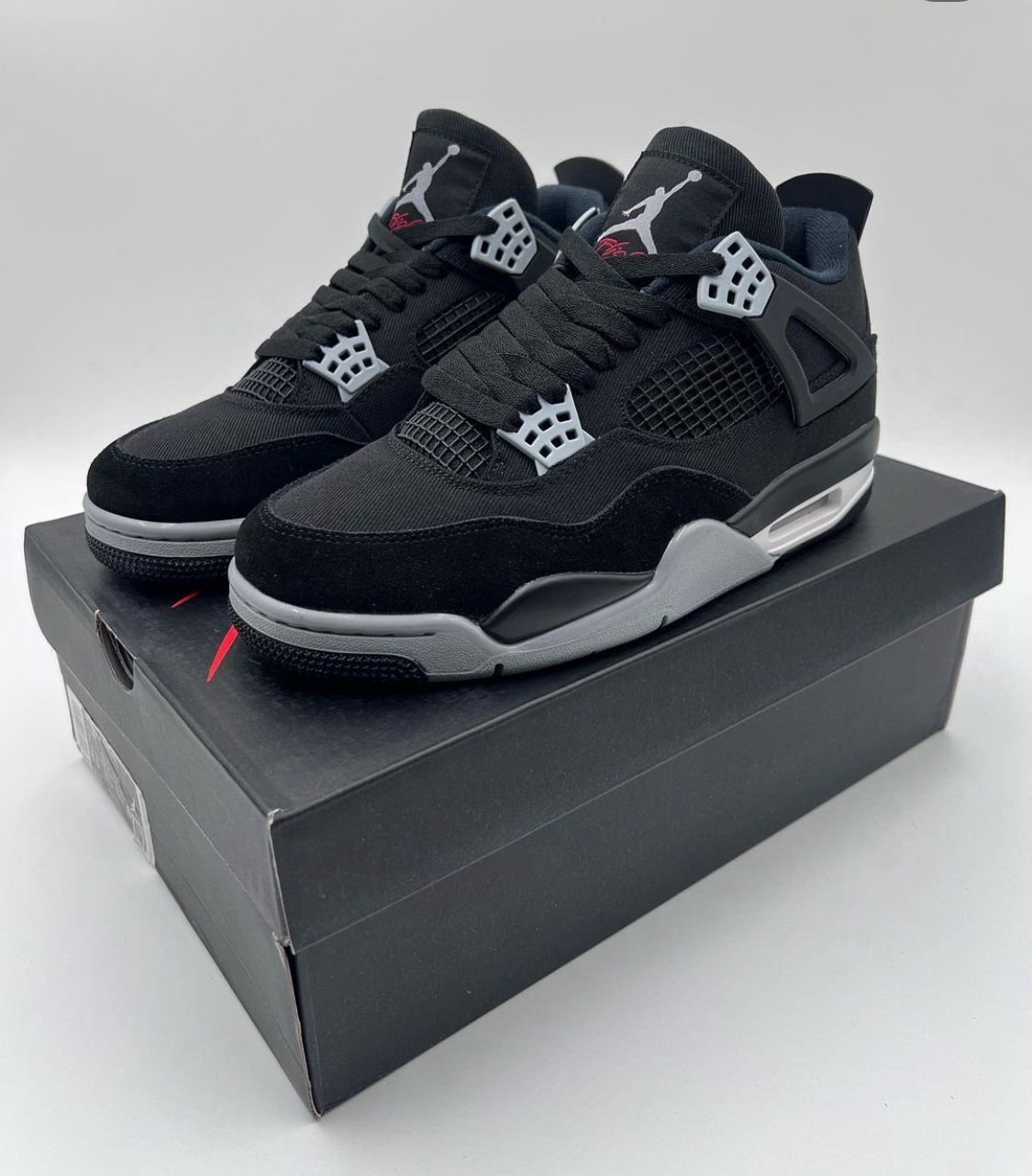 Black Canvas Jordan 4