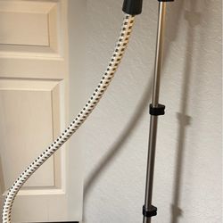 Shark Upright fabric steamer with hose and handle.