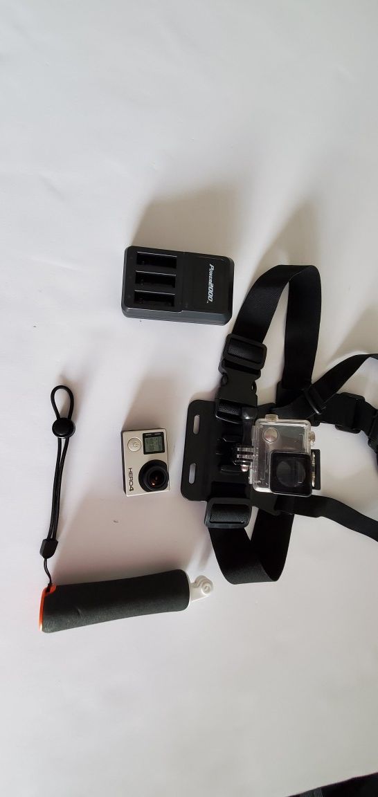 GoPro Hero 4 Camera with Underwater Housing, Handle, Chest Strap, Battery, and Charger