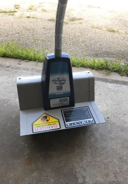 Electric snow thrower