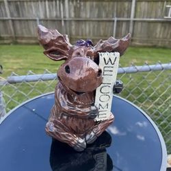Welcoming, moose statue