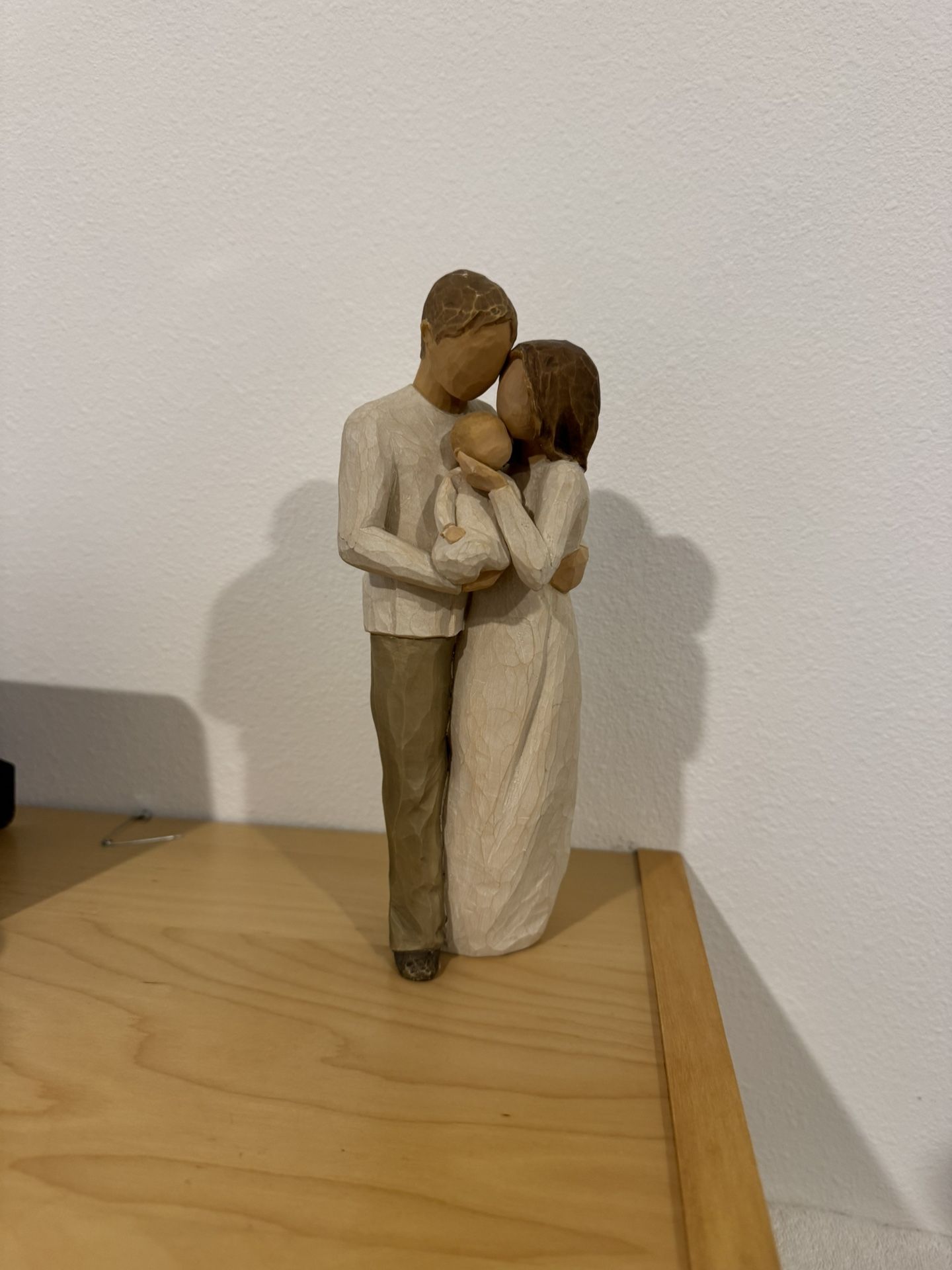 Father, Mother, and Baby Figurine