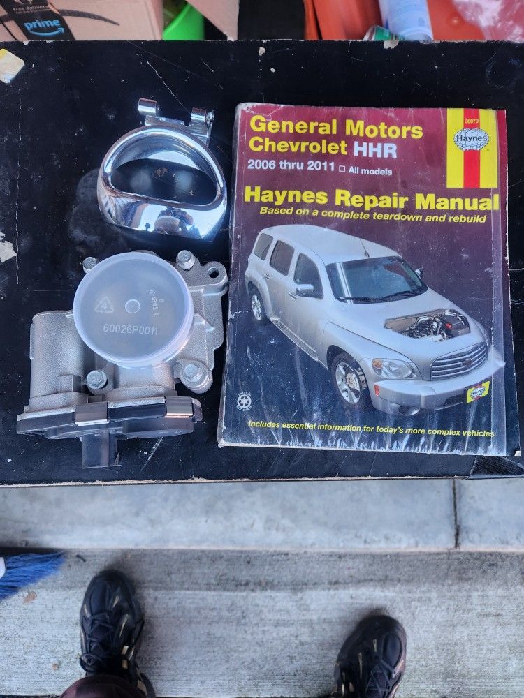 HHR Auto Repair Book ,Brand New Throttle Body And Door Handle.