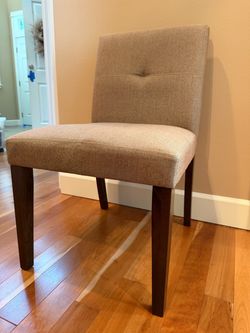 Desk or accent chair with medium brown legs