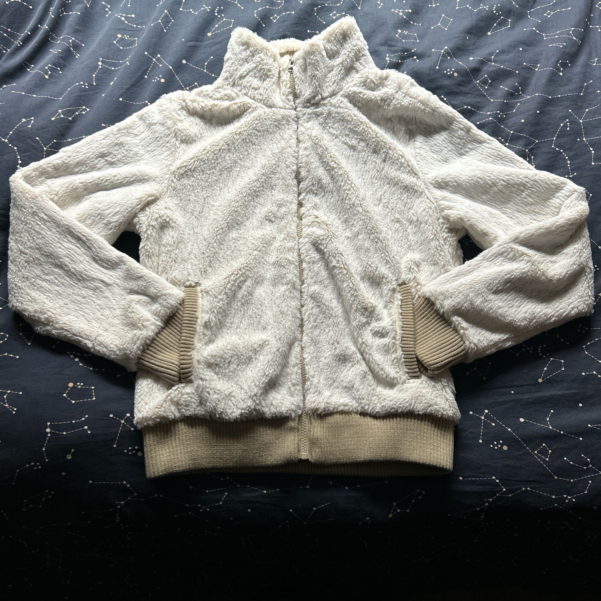 tan and cream faux fur Patagonia zip up jacket
