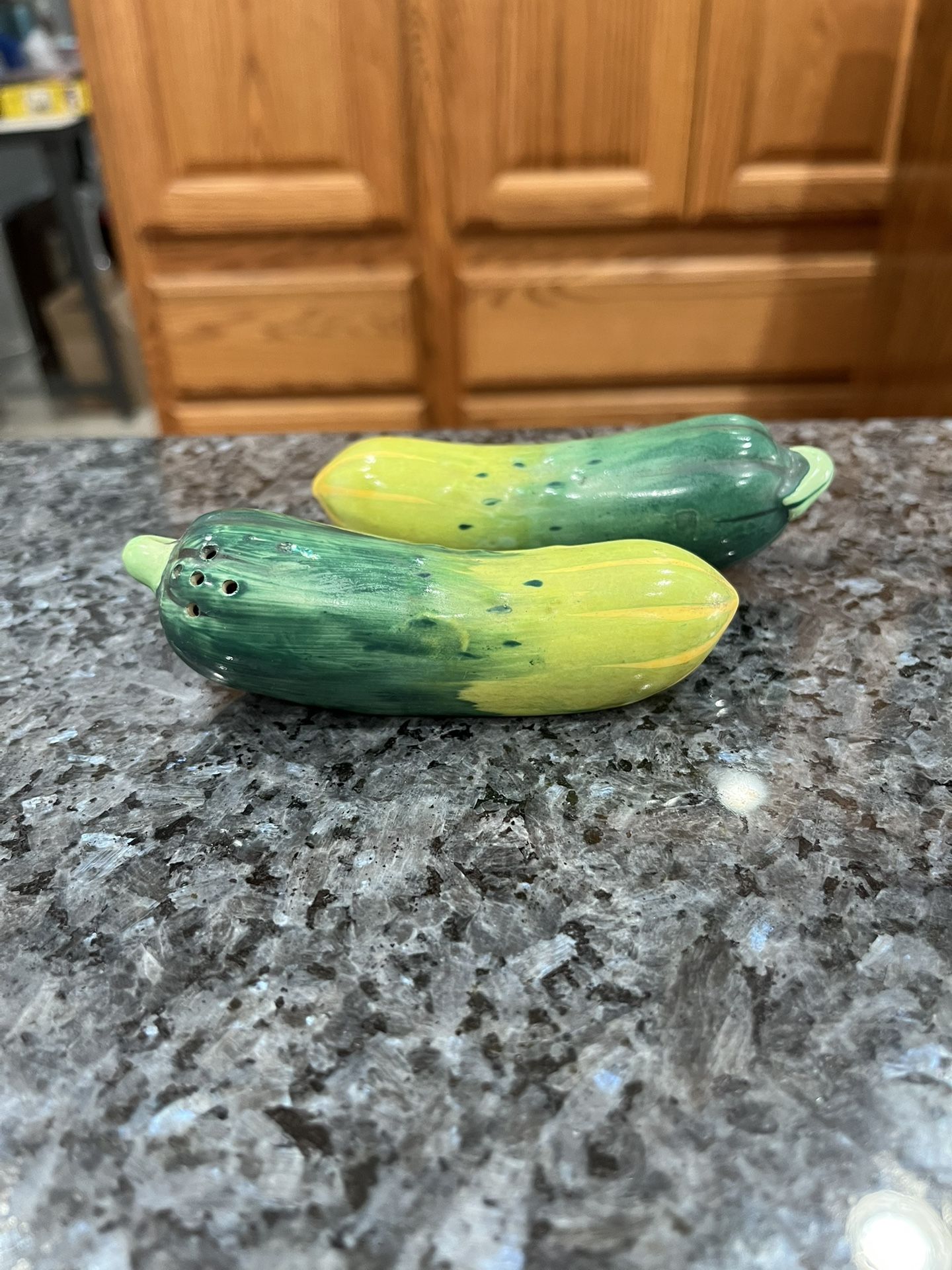 Ceramic Vintage Japan Pickles Pair of  salt and pepper shakers.  Preowned.  Has been on display in a cabinet with a salt and pepper shakers collection
