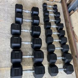 New pair of 5,10,15,20,25,30,45 and 50lb rubber dumbbells  NEW IN BOX $400