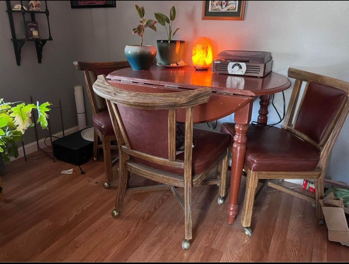 Vintage Rolling Chairs And Table