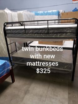New twin bunkbeds with new mattresses $325