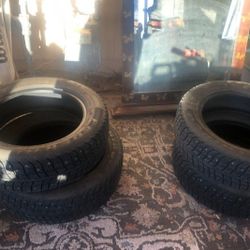 4 STUDDED SNOW TIRES