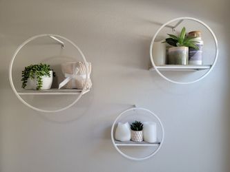 Round white metal decorative shelves