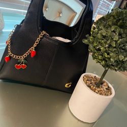 Never full Charm And Crossbody Strap  