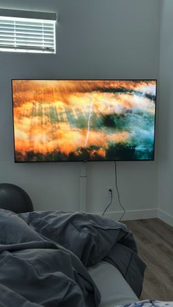 70 inch Roku tv with stand