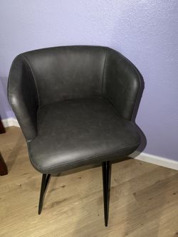 Grey Spinning Chair