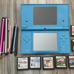Nintendo DSi With Games And Stylus