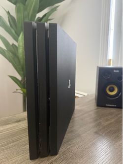 PS4 Pro and 2 Controllers