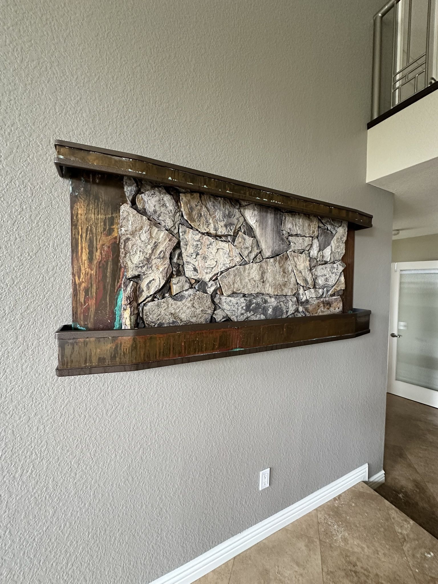 Rustic Stone Waterfall meets Modern Copper