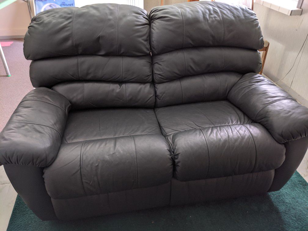Leather Dual recliners loveseat
