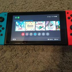 Nintendo Switch 32GB Console With Red/Blue Joy-Con (Newest Model V2)