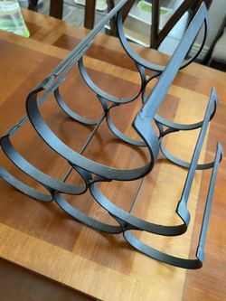 Two beautiful metal wine bottle racks