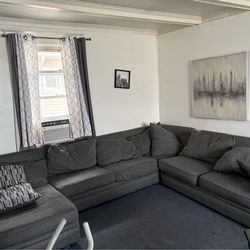 Two sectional couches and a dining table everything for $400