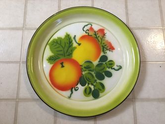 Old, metal fruit plate