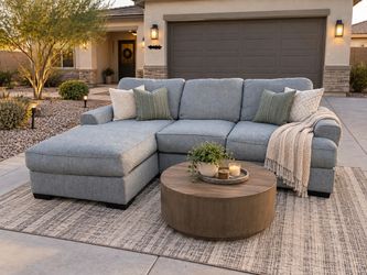 Beautiful down filled gray Ashley furniture sectional - delivery available
