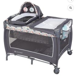 Baby Trend Lil Snooze Deluxe II Nursery Center Playard – Full-Size Bassinet, Changing Table & Tote Bag