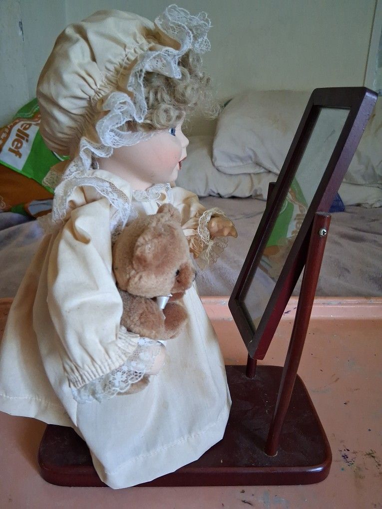 Doll In Mirror