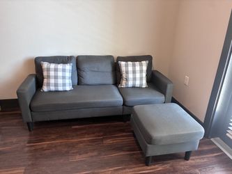 Sofa with ottoman and pillows