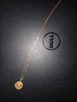 Supreme justice gold pendant