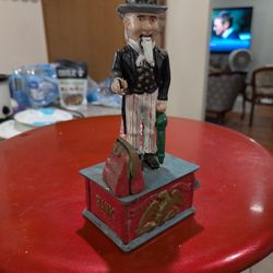 Antique Action Piggy Bank