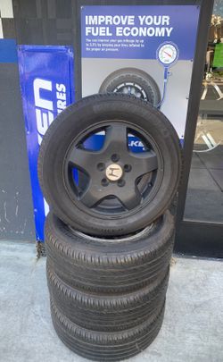 OEM honda wheels 15" 5x4.5 with set of 4 good used tires $330