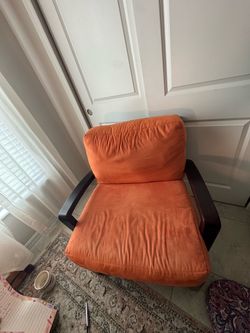 Orange Accent Chair with Dark Wood Frame