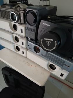 Projectors qty 8 some work for parts or repair all for $100