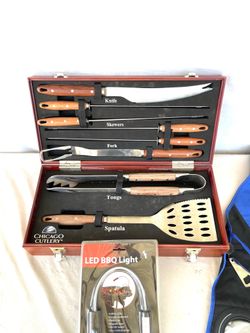 New only used twice eight piece BBQ cooking with light and apron
