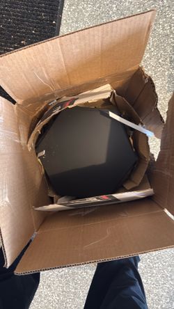 10 or so black ceramic hexagon tiles