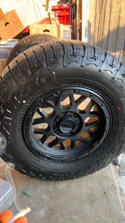 KMC Matte Black Wheel with All-Terrain Tire