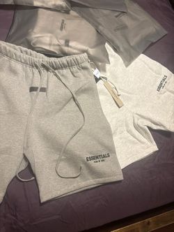 Essentials Fear of God shorts colors light gray and dark gray