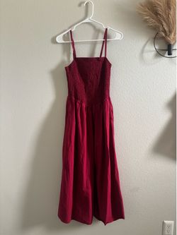 Red dress to stops at low shin