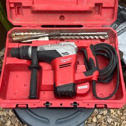 Rotary Hammer/2 Drill Bits And Rod Pounder.