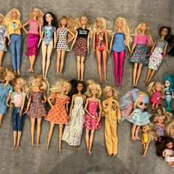 Lot Of 25 Barbie Dolls With Clothing