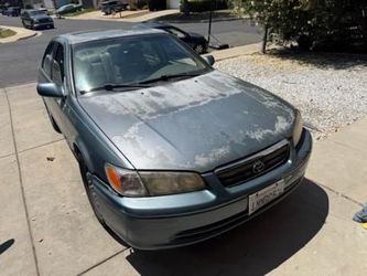 2001 TOYOTA CAMRY LE. Smogged & Registered. $1800 obo