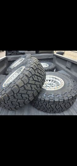17" KMC w/ 35" Toyo RT Trail
