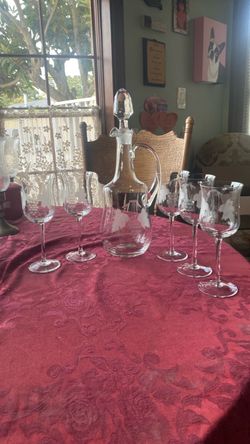 Glass grape etched wine caraffe with 5 matching wine glasses